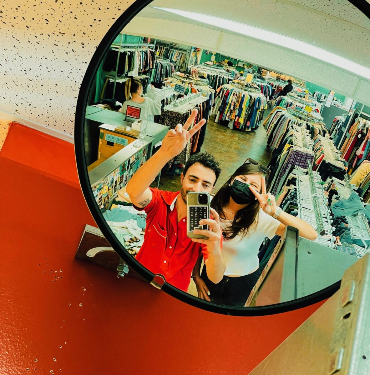 Jose Corres and Fernanda Garza search the aisles of a local Goodwill for hidden treasures. Photo courtesy of Jose Corres