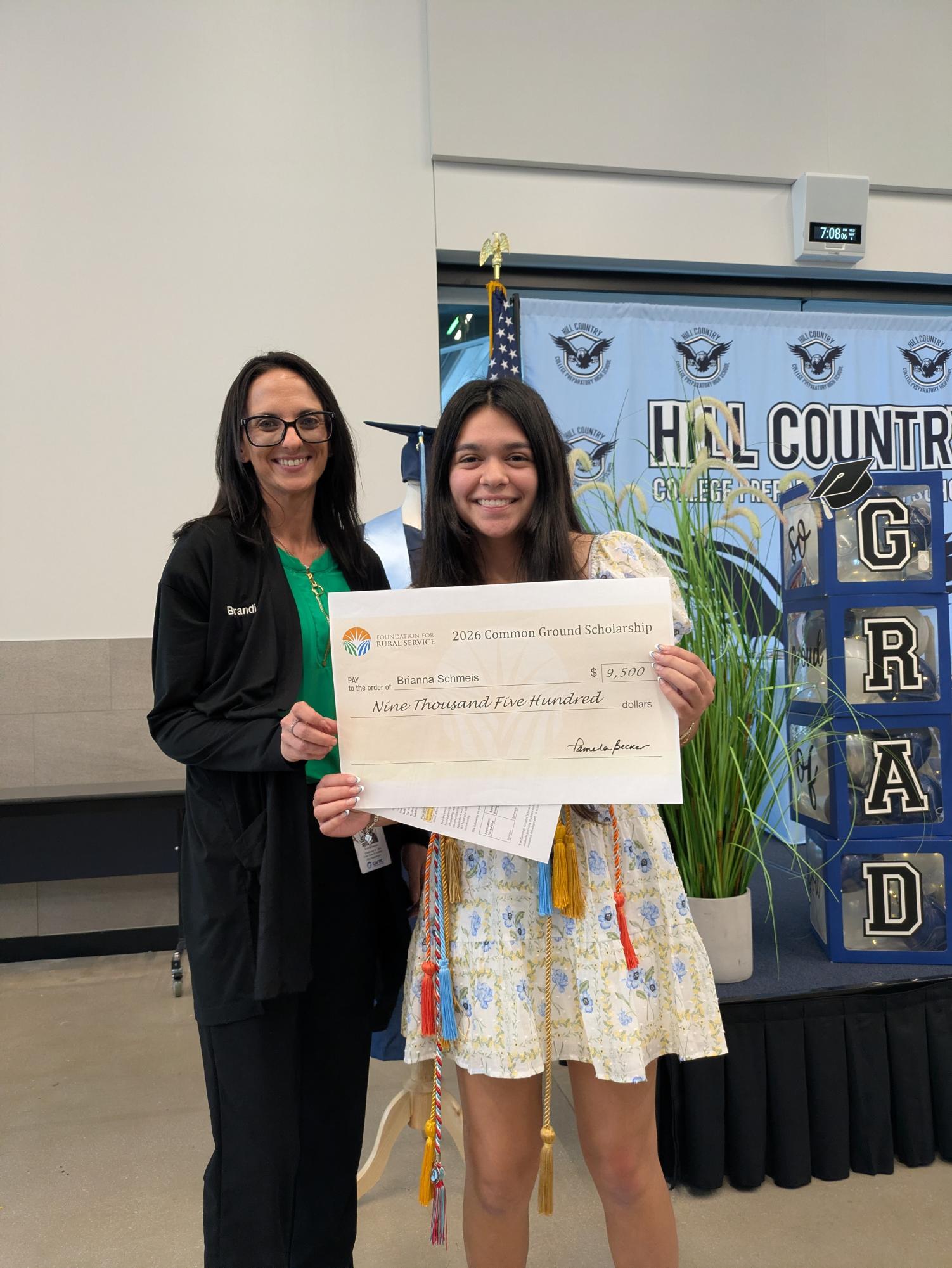 Senior Brianna Schmeis receiving the 2026 "Ground Common Scholarship."